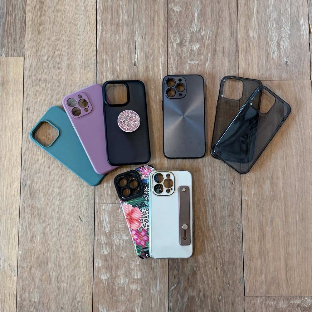 Assorted Protective Smartphone Cases in Teal, Purple, Black, Gray, White